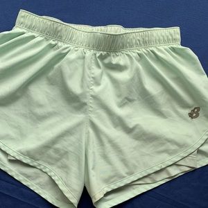 New balance, teal shorts